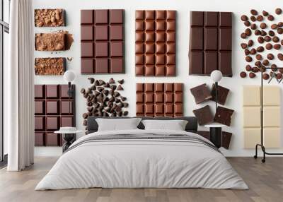 Collage with tasty different chocolate bars on white background, top view Wall mural