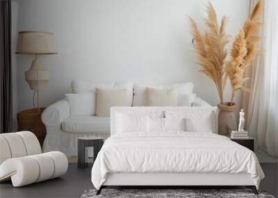 Cozy white sofa, lamp and vase with pampas grass isolated on whi Wall mural