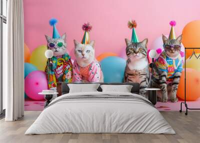 Creative animal concept. Group of cat in funky Wacky wild mismatch colourful outfits isolated on bright background advertisement Wall mural