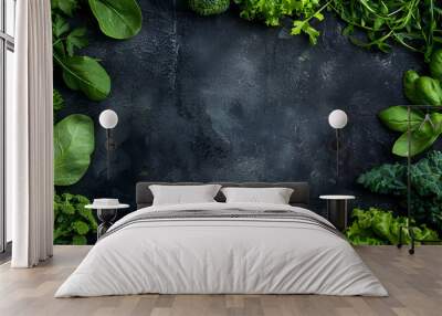 Frame of green raw vegetables on black background. Top view of healthy organic food. Flat lay. Copy space Wall mural