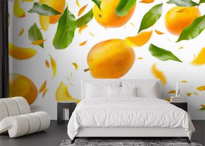 Fresh ripe mango with leaves falling in the air isolated on white background Wall mural