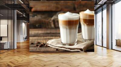 glasses of latte macchiato coffee on a wooden background Wall mural