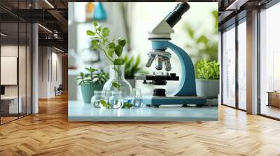 Laboratory glassware with plants and microscope on table, space for text. Biological chemistry Wall mural