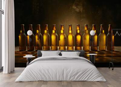 Many bottles of beer on wooden table against dark background Wall mural