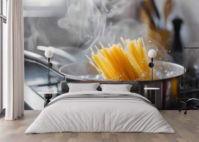 pan of boiling water with spaghetti on the cooker in the kitchen Wall mural