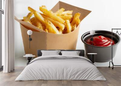 Paper box with tasty french fries and bowl of ketchup on white background Wall mural