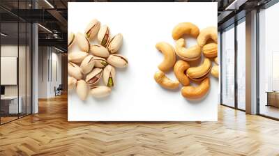 Tasty pistachio nuts and cashews isolated on white, set Wall mural