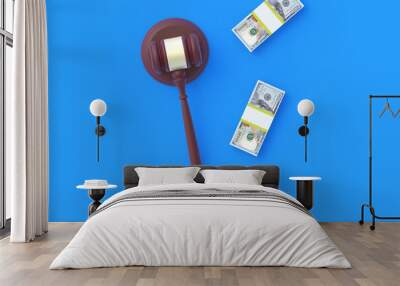 Judge gavel and cash on blue background. Payment for legal education. Bidding at auctions. Liability for corruption. Protection of rights. Law and fine. Tax avoidance. Property division. 3d rendering Wall mural