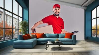 Man on gray background. Courier, Delivery Man. Wall mural