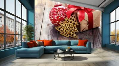 Christmas decoration (box,origami christmas tree) over wooden ba Wall mural