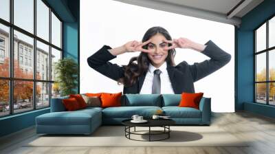 Business woman with victory sign. Happy positive funny businesswoman show victory v-sign gesture isolated on white background, studio portrait. Portrait of attractive funny crazy student. Wall mural