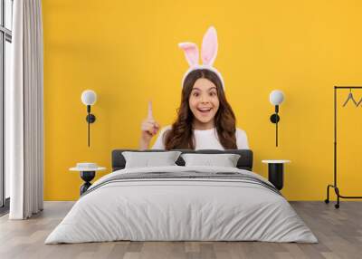 inspired with idea kid in bunny ears on yellow background, easter Wall mural