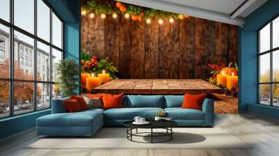 An empty wooden platform against a wooden wall with decor of lit candles, pumpkins, pine cones and plants on the sides of the platform. Thanksgiving, Halloween, Christmas concept. Copy space Wall mural