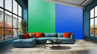 The paper texture is blue and green, and the background has space for text or images. Wall mural