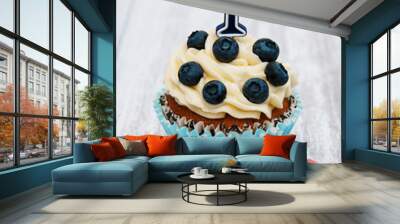 Cupcake with a numeral one candle Wall mural