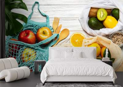 Mesh shopping bags with fruits Wall mural