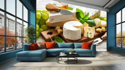 Various types of cheese  on a white wooden  background Wall mural