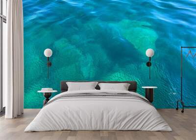 Sea water blue emerald ripples surface background. Wall mural