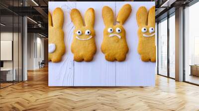 Easter bunnies. Gingerbread easter cookies in shape of bunny on a white background Wall mural