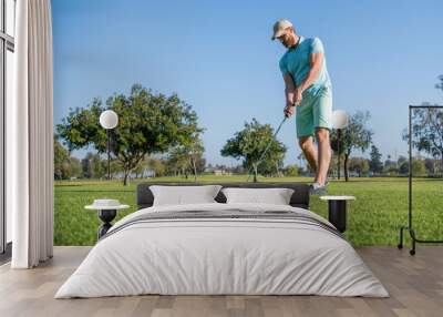 summer activity. professional sport outdoor. male golf player on professional golf course Wall mural