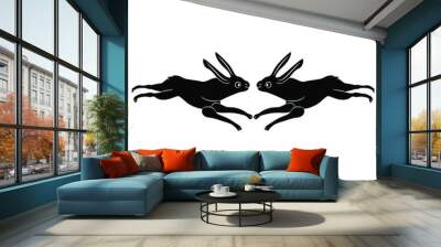 Symmetrical animal design with two running hares or rabbits. Black and white silhouette. Antique Celtic or Roman motif. Wall mural