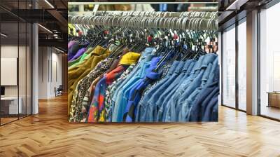 clothes in the store on hangers. concept Wall mural