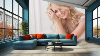 Close up portrait of young beautiful woman indoors Wall mural