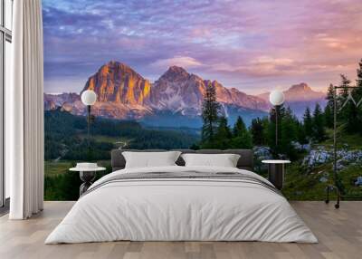 Panoramic view of famous Dolomites mountain peaks glowing in beautiful golden evening light at sunset in summer, South Tyrol, Italy. Artistic picture. Beauty of mountains world Wall mural