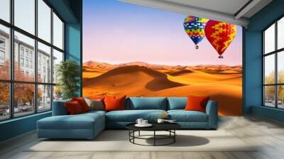 Travel concept. Amazing view of sand dunes with hot air balloons in the Sahara Desert. Location: Sahara Desert, Morocco. Artistic picture. Beauty world. Wall mural