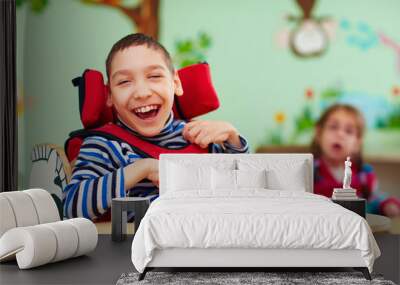 cheerful boy with disability at rehabilitation center for kids with special needs Wall mural