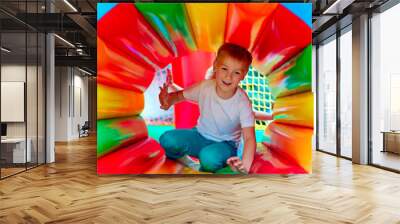 happy kid having fun on playground in kindergarten Wall mural