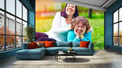 portrait of happy women with disability on spring lawn Wall mural