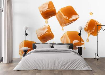 Salted caramel cubes levitation isolated on transparent background. Wall mural