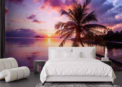 Beautiful bright sunset on a tropical paradise beach Wall mural