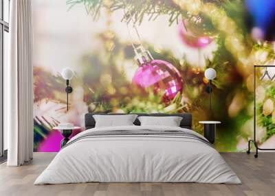 Christmas decorations on a green Christmas tree. Festive Christm Wall mural