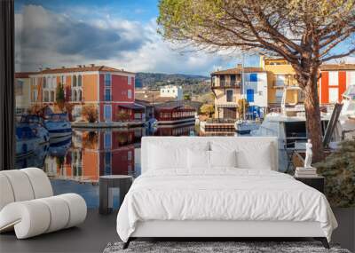 Colorful city on the water, Port of Grimaud, Côte d'Azur, France, Provence, houses and boats. Beautiful city landscape Wall mural