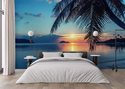 Magnificent beautiful bright tropical sunset, sun, palms, sandy beach Wall mural