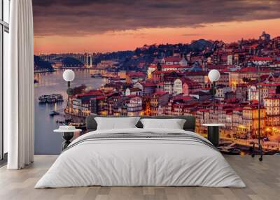 View to Porto over river Douro with reflection of the lights at night Wall mural