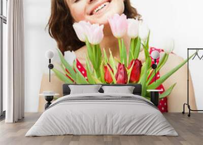 young beautiful woman with a vase of flowers, isolated on white Wall mural