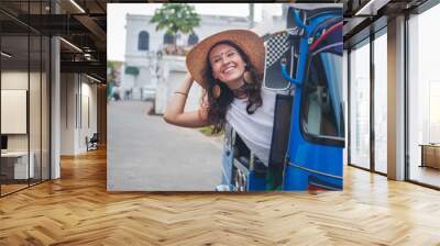 Young stylish european girl woman sitting in tuk-tuk traditional transport in Asia Galle, traditional transport in Sri Lanka, travel Ceylon Island Wall mural