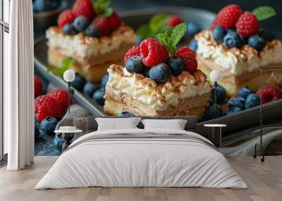    a dessert plate with two close-up treats - berries and raspberries are arranged beside them Wall mural