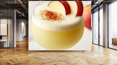  An image of an apple cider with cinnamon sprinkles and an apple next to it Wall mural