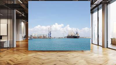  View on the sea port. Cranes in cargo port  Wall mural