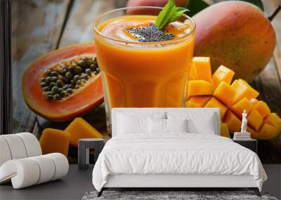 A glass of mango and papaya smoothie, a delicious and healthy breakfast Wall mural