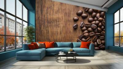 A wooden background with coffee beans creating an elegant and textured design. Background, wallpaper, banner Wall mural