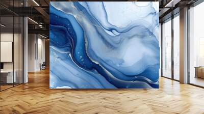 Abstract painting of liquid ink on paper with a marbled blue and silver background. Wall mural