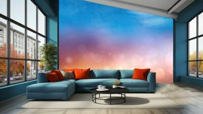 Abstract sunset illustration. Abstract evening or sunset mood background texture with orange and gold colored bokeh lights of lit fantasy city and cloudy blue sky. Beautiful sunset. Wall mural