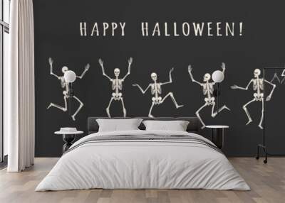 Banner of 13 dancing and jumping skeletons isolated on a black background. Happy Halloween. Vector illustration Wall mural