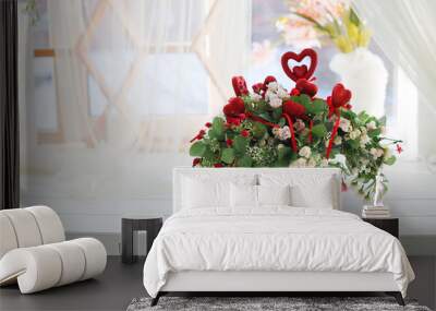 beautiful composition of spring flowers and red hearts. A gift for St. Valentine's day. Wedding concept Wall mural