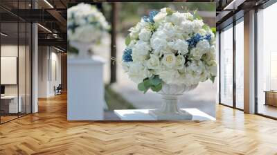 Beautiful wedding bouquet in stone vase closeup, outdoors Wall mural